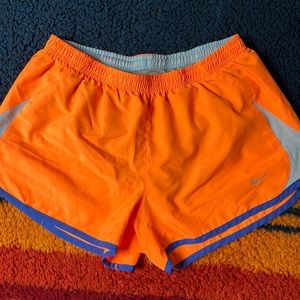 Nike Tempo orange running shorts, size Medium